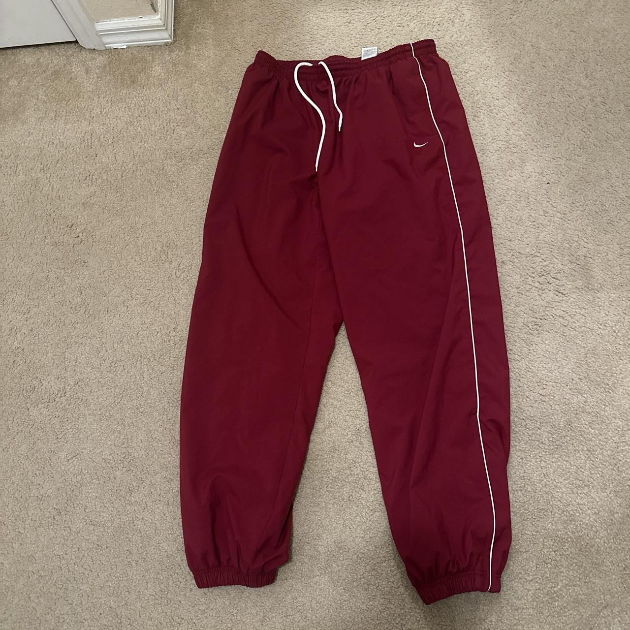 baggy Nike track pants size Large with a baggy... Depop
