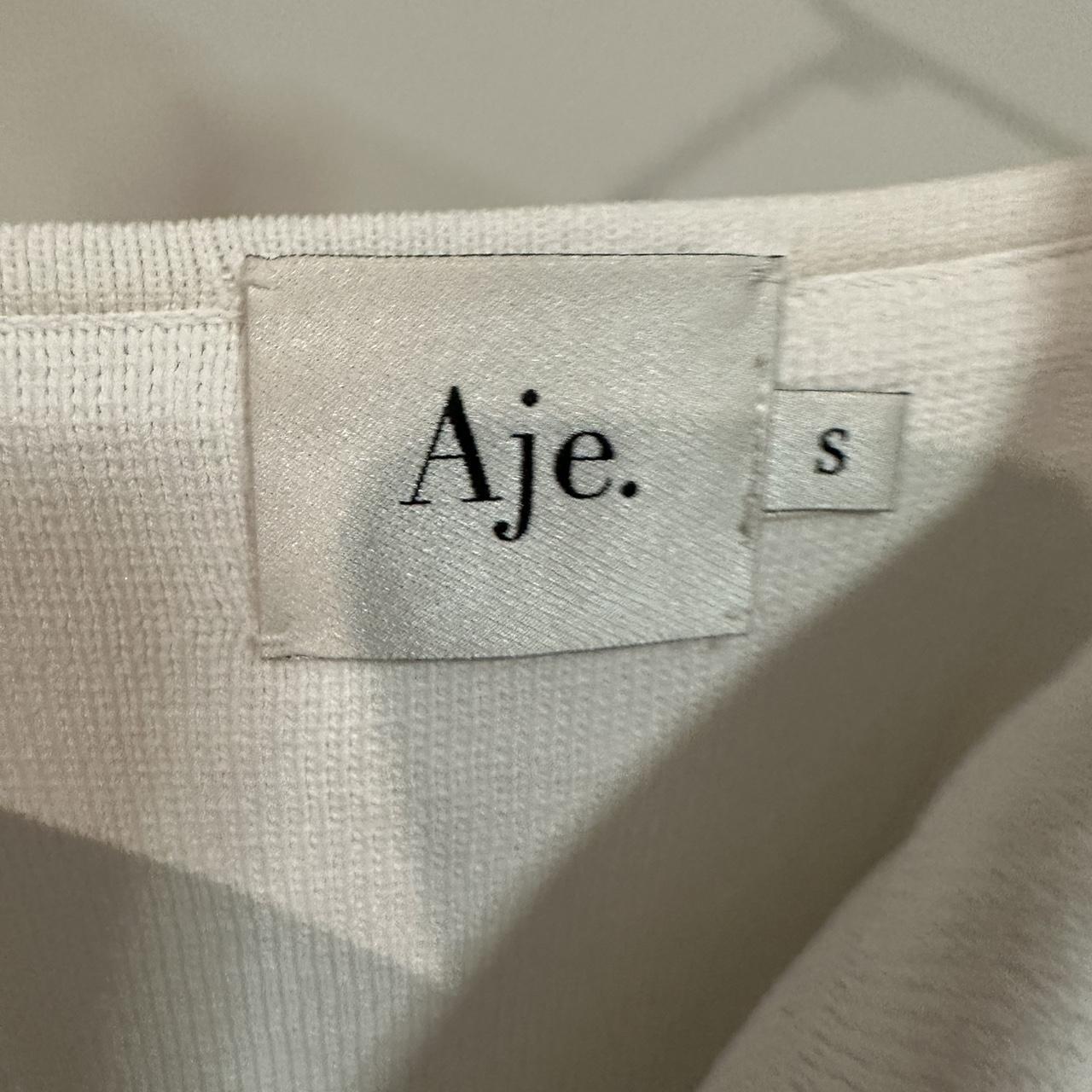 Aje cropped white shirt, size S, small stain barley... - Depop