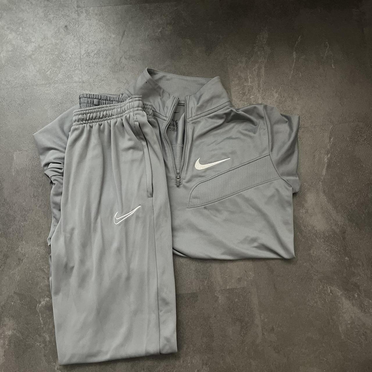 Grey nike tracksuit Size XL junior - Depop