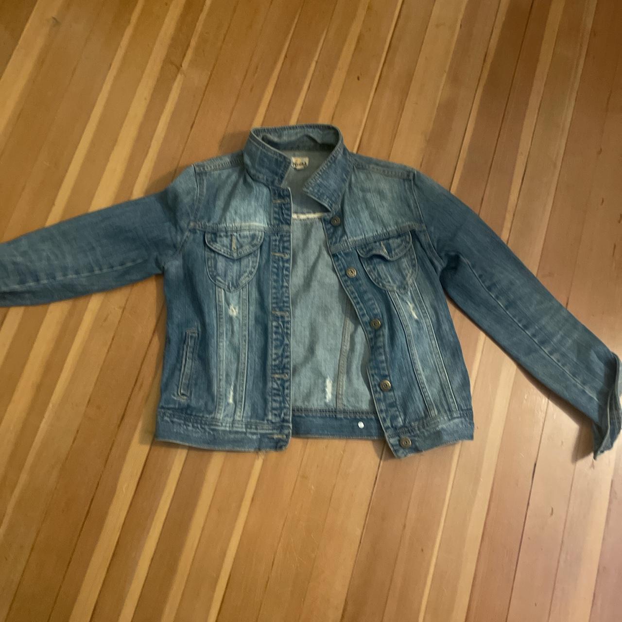 Denim jacket with rips in clearance back