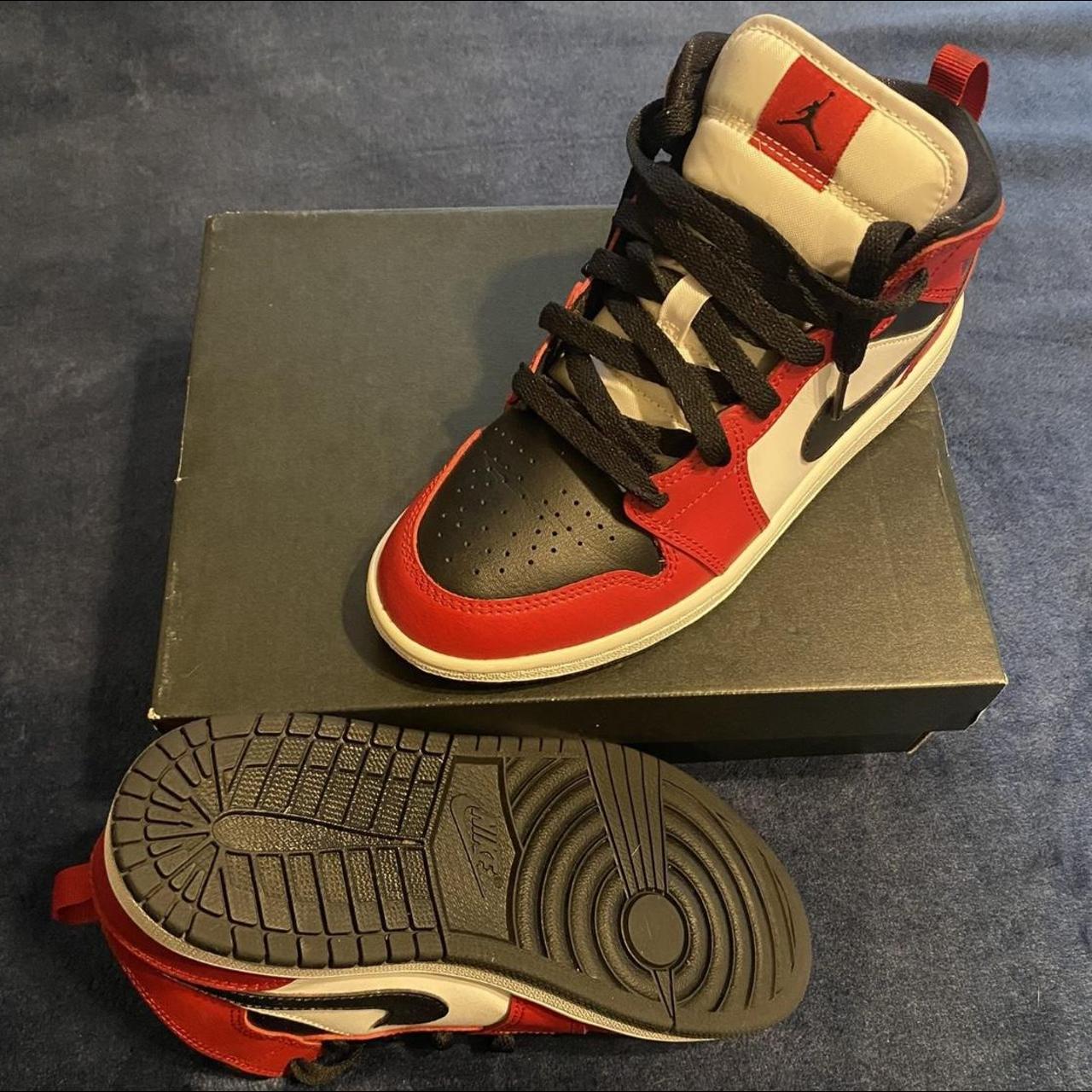 black jordans with rainbow bottom