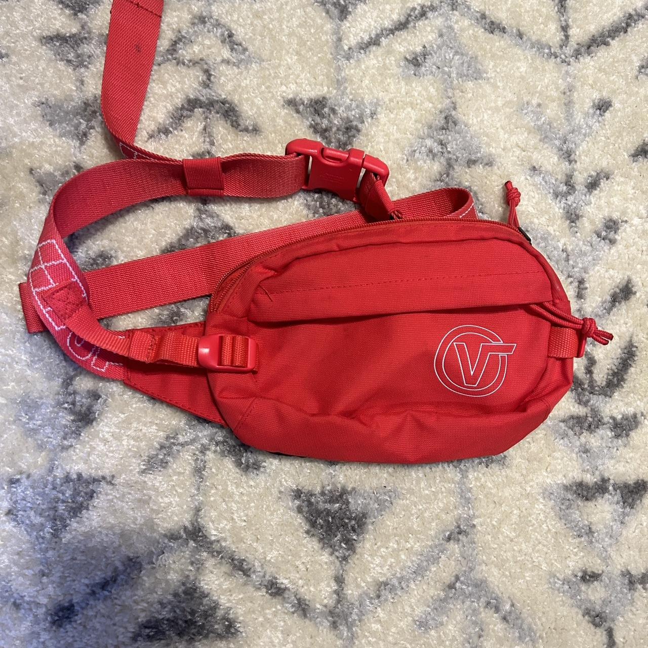 Red Vans crossbody fanny pack has a small black