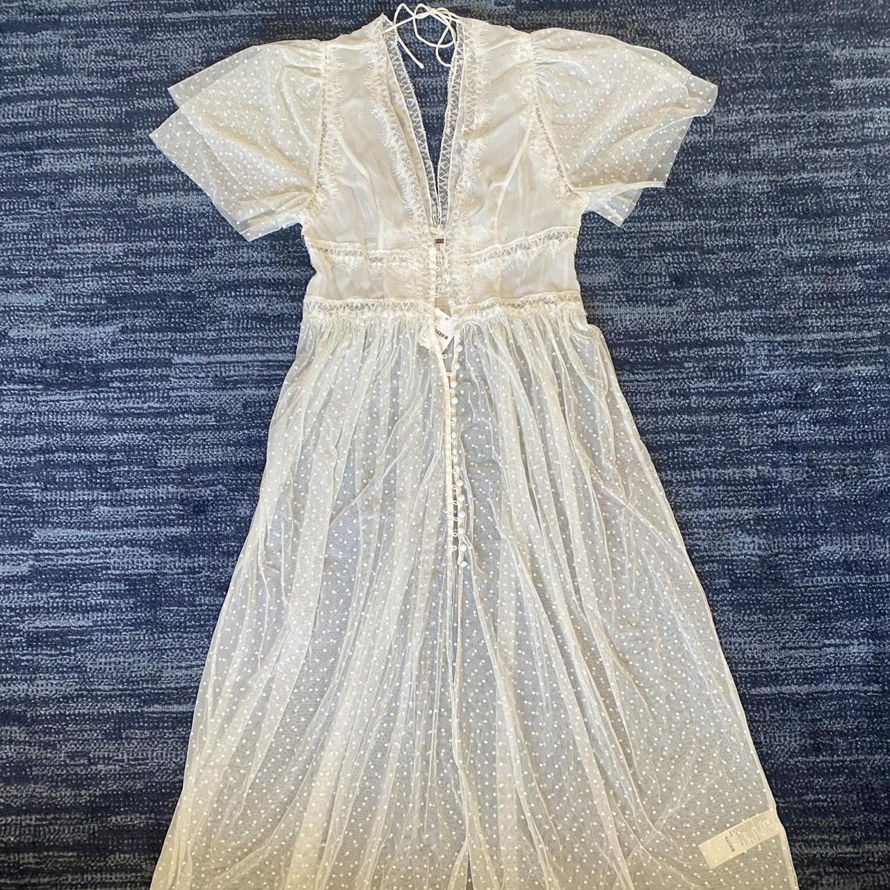 Free people white lace dress that buttons up in the Depop Free people white lace dress that buttons up in the Depop