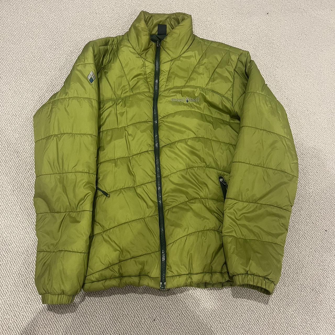 Green Montbell Puffer Jacket Label Reads L but they... - Depop