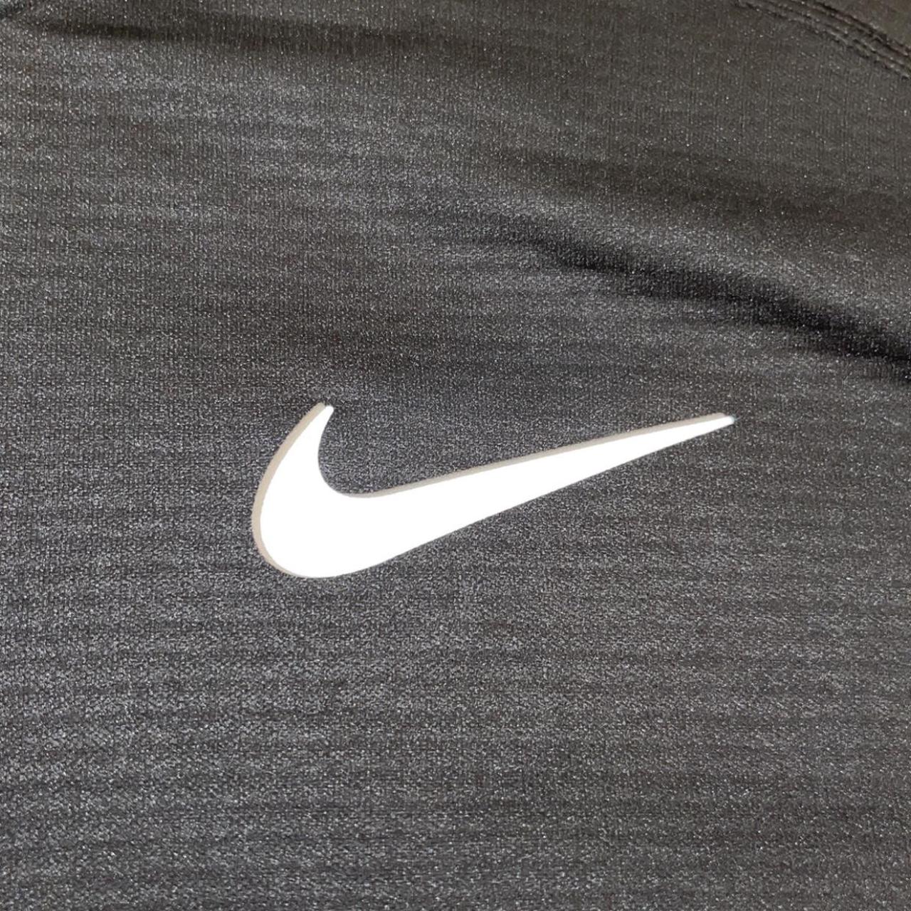 Nike dri fit running 1/4 zip in black - Depop