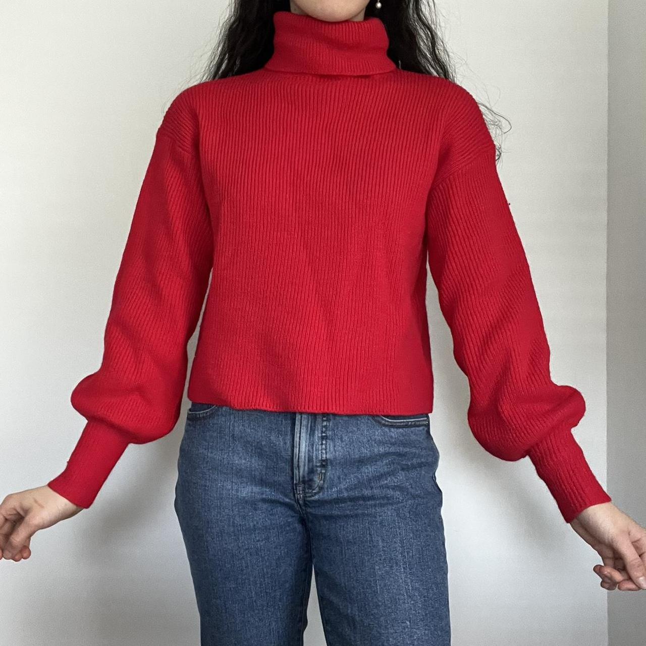 bright red turtleneck sweater