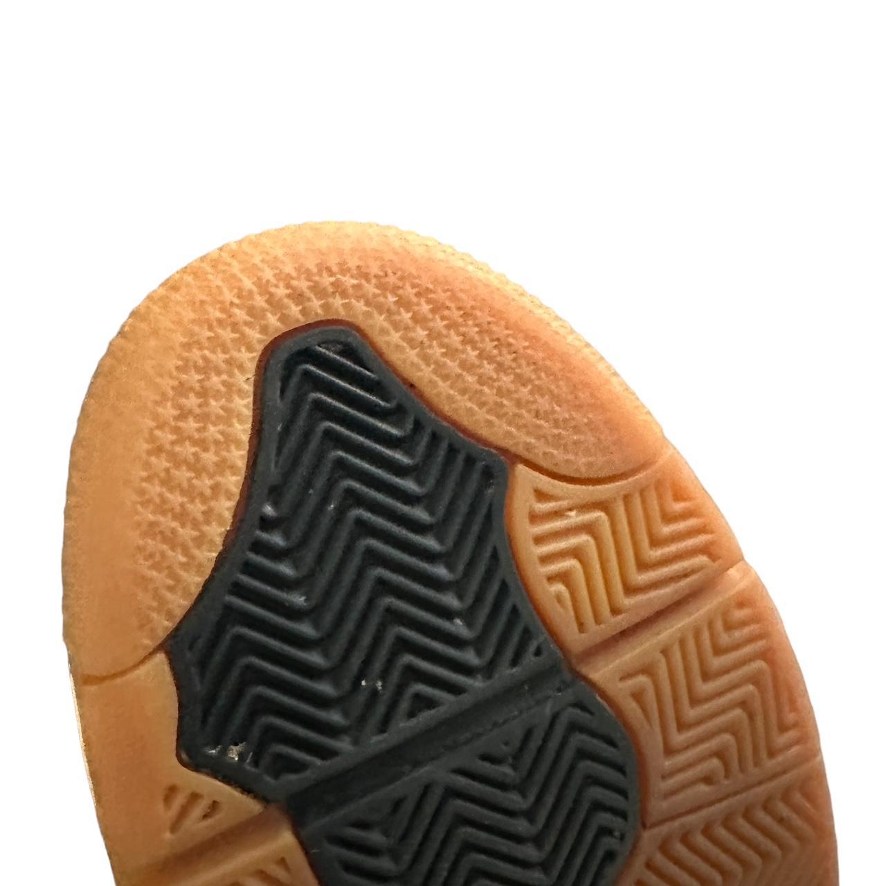 tan and black jordan 4