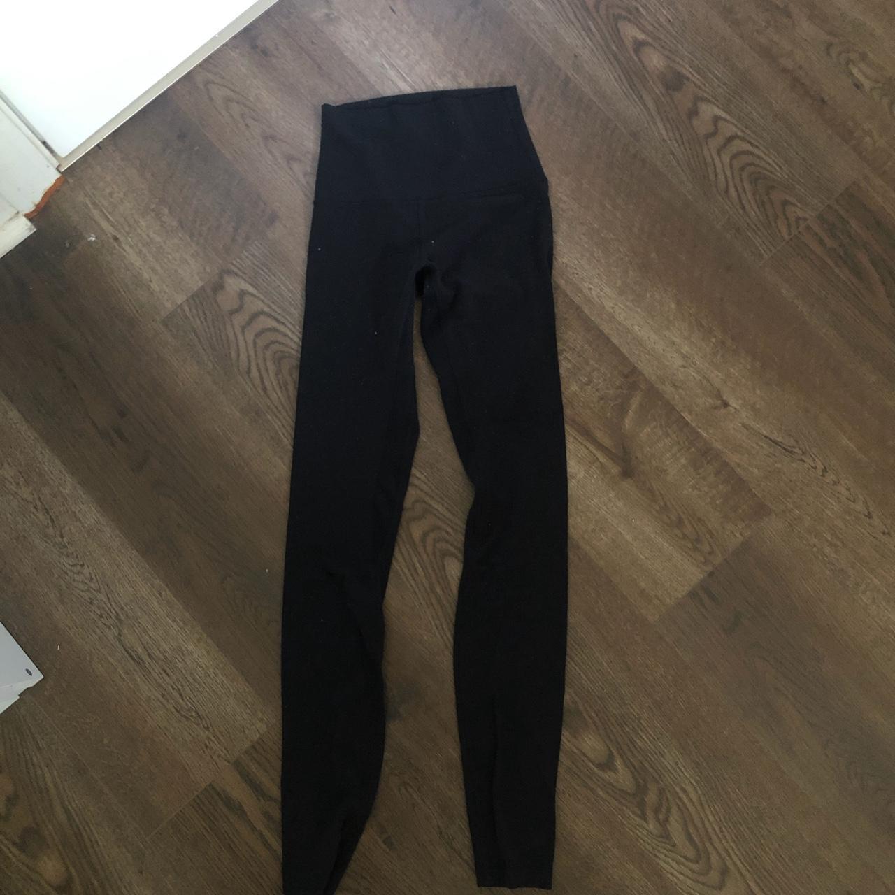 LULULEMON black leggings , -size 0, -small hole on