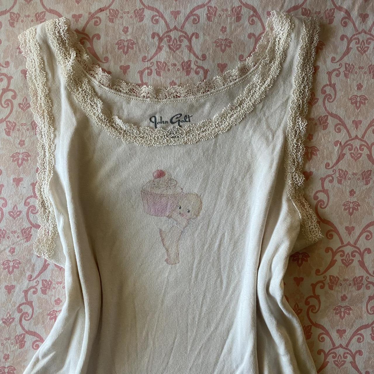 brandy melville baby holding a cupcake tank... Depop