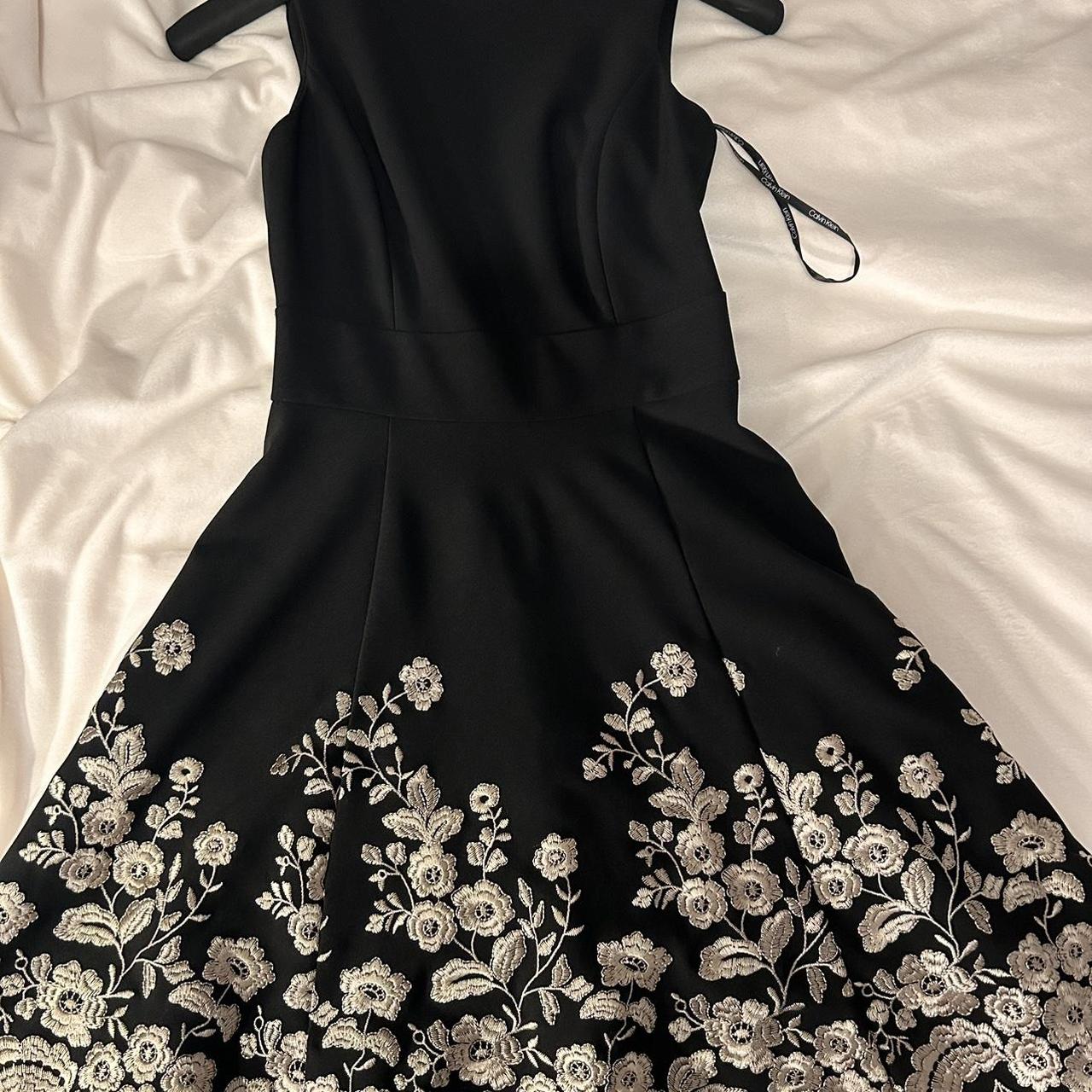 Black dress with gold flowers hotsell