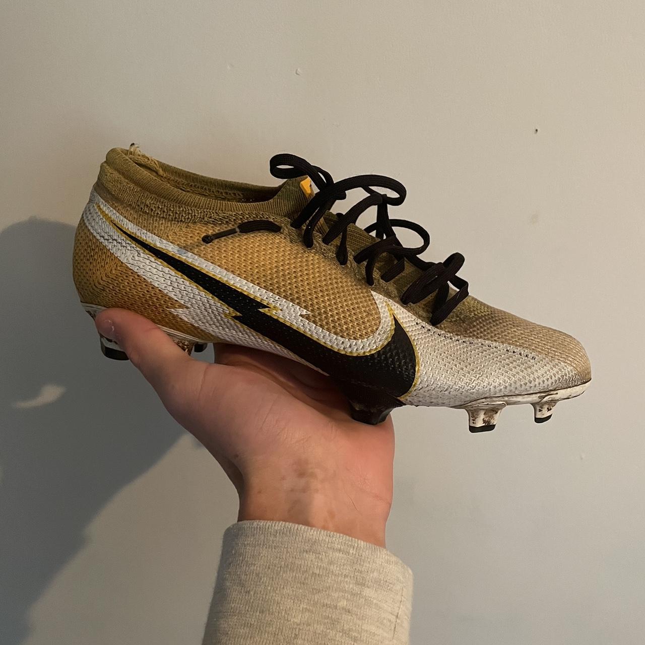 nike yellow and black football boots
