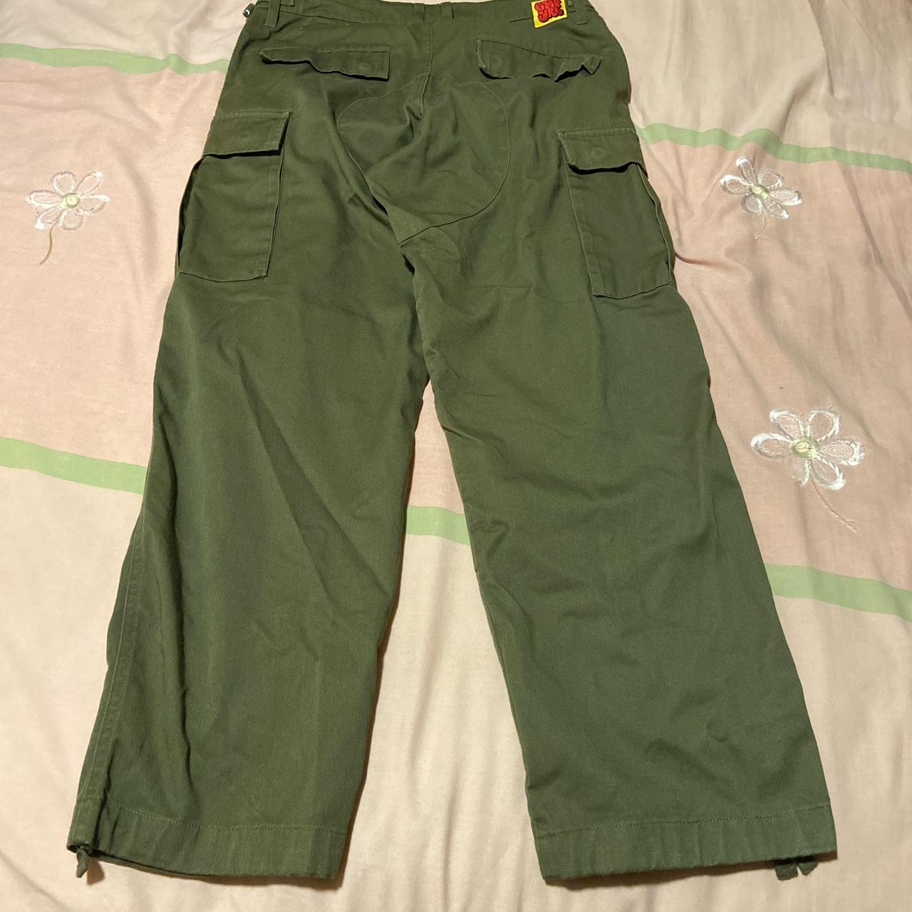 green empyre cargos size 28x29 has 3 small silver... - Depop