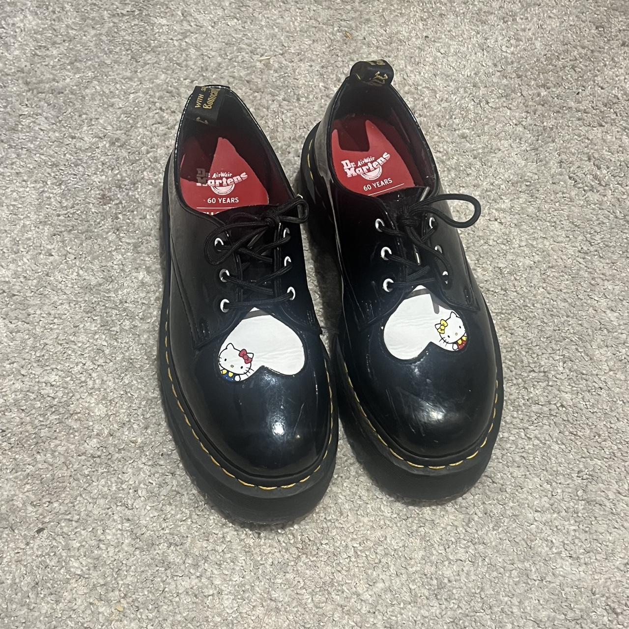 Hello kitty doc martens Very very obvious sign of... - Depop