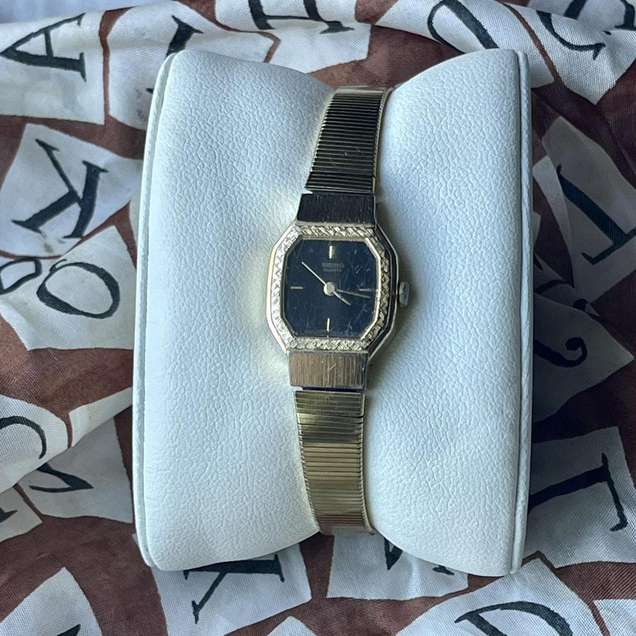 classic Seiko watch in gold with a black dial and... Depop