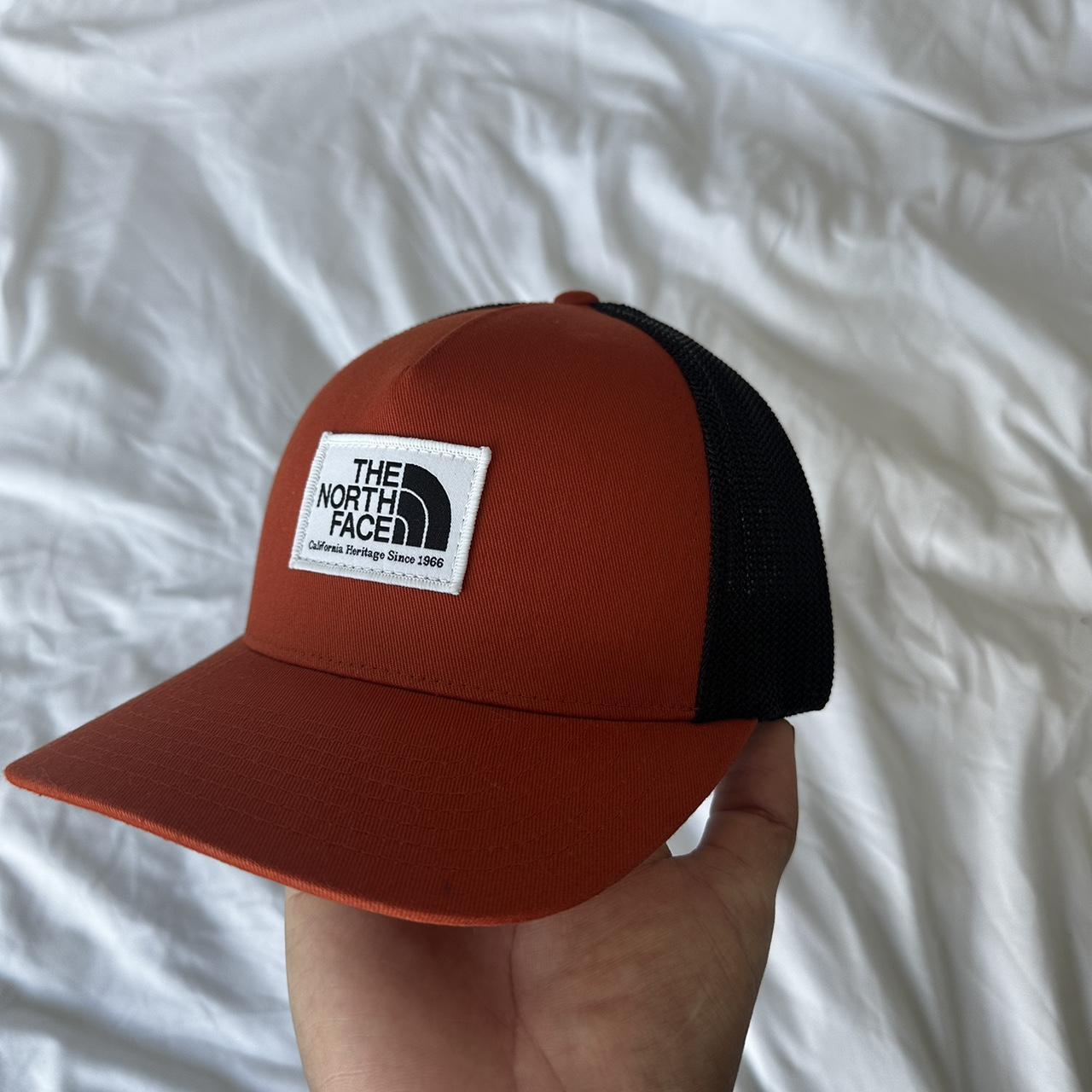 North Face Blood orange trucker hat - Depop