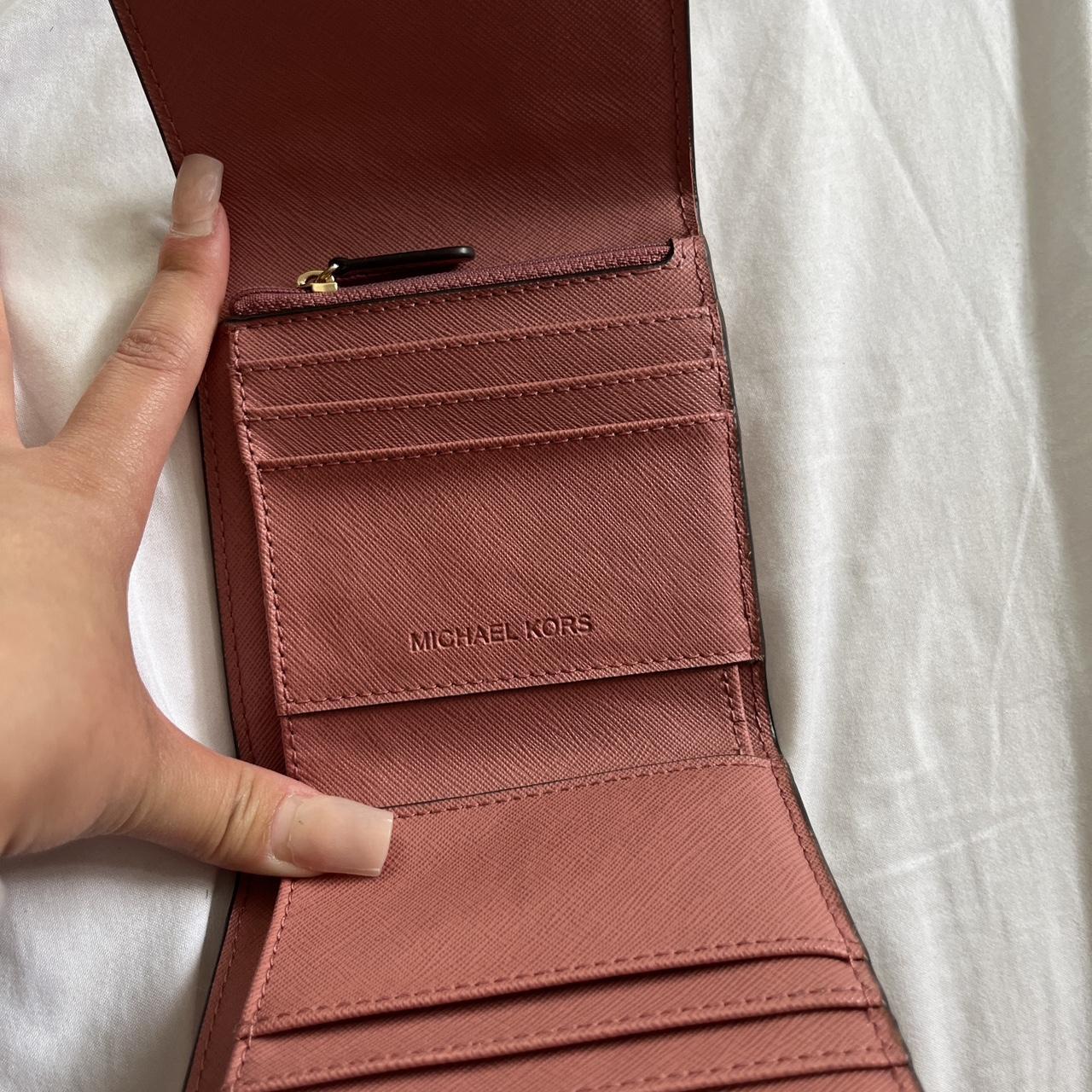 Hot pink Michael Kors wallet. Has six card holder - Depop