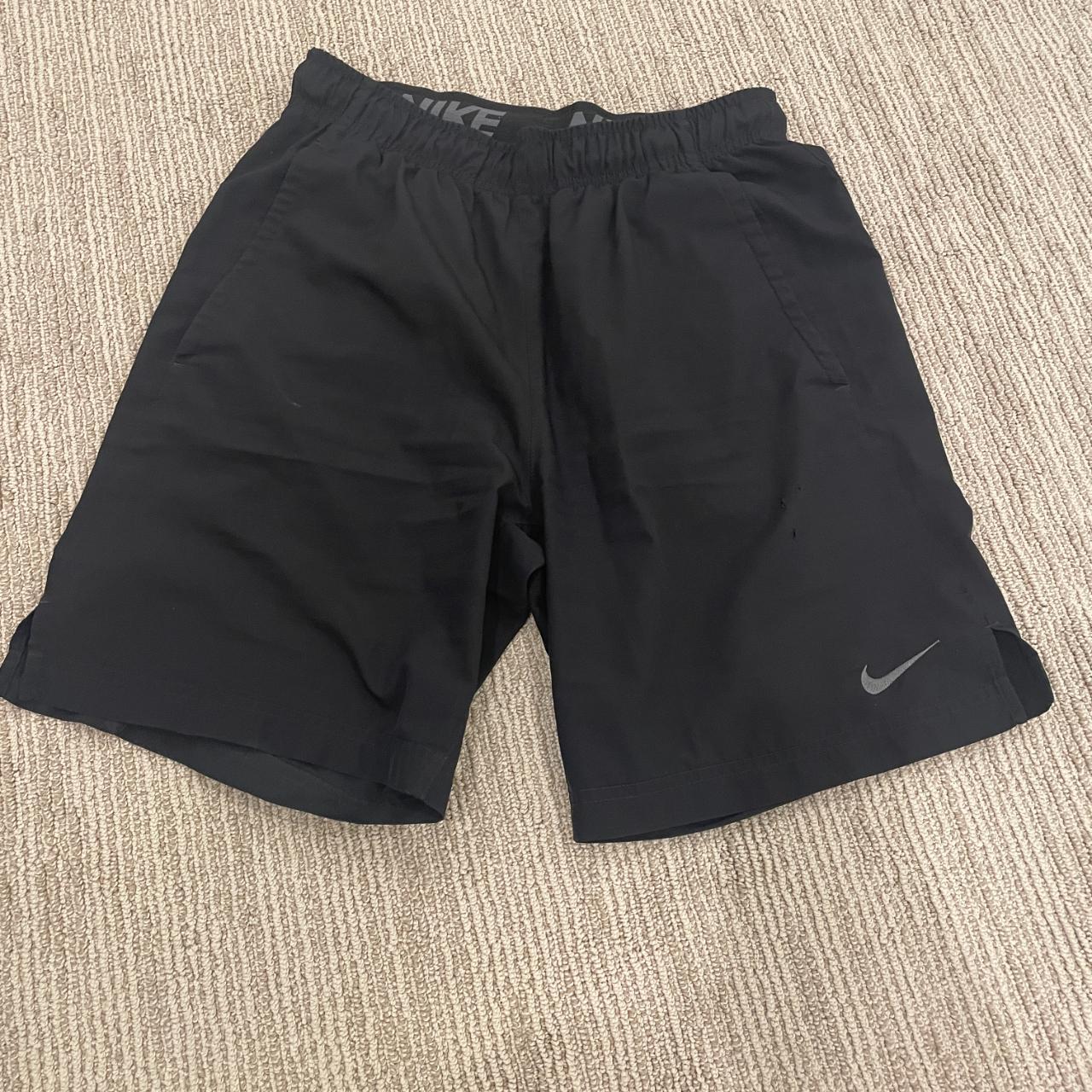 nike shorts black and gold