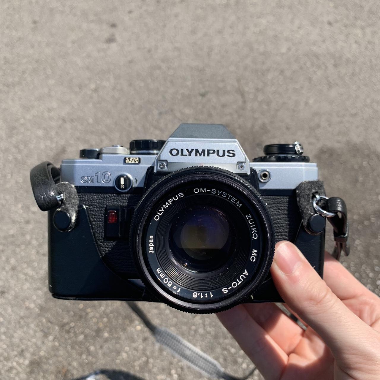 Olympus OM10 35mm film camera with 2 lenses Olympus... - Depop