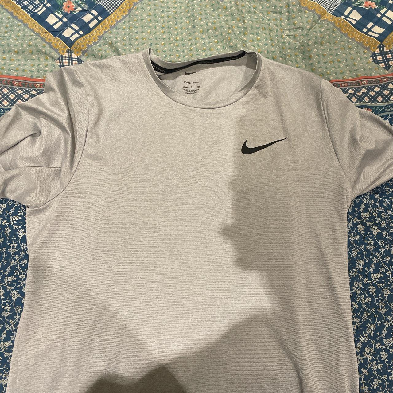 Grey Nike dri fit t shirt Worn a handful of times... - Depop