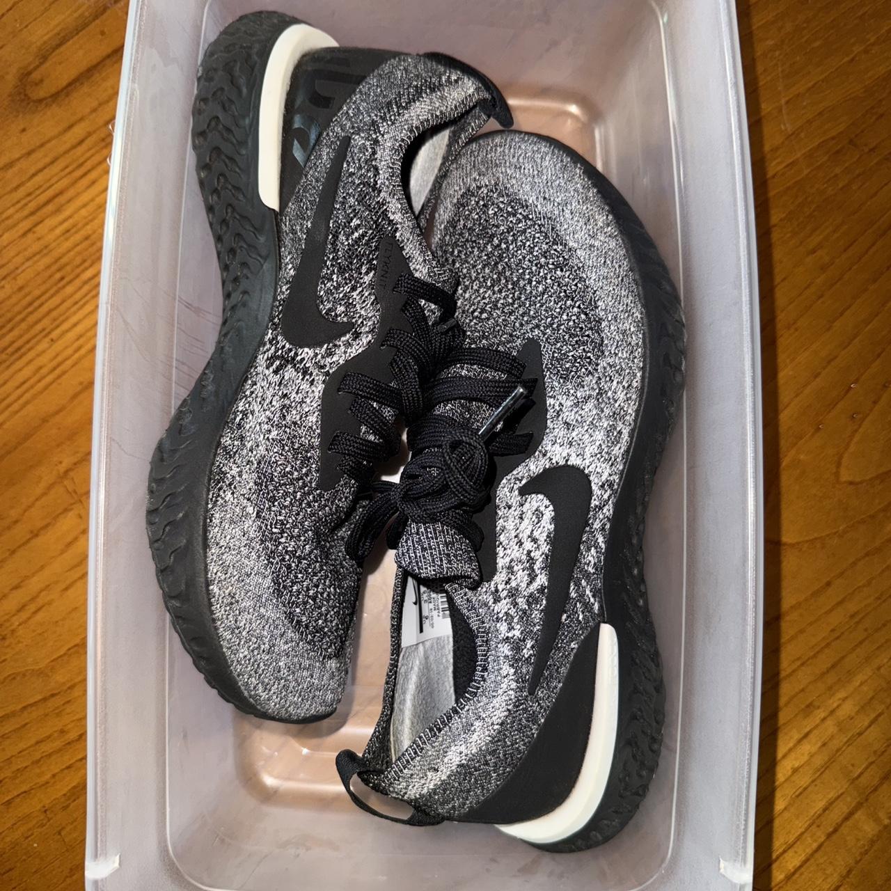 nike running epic react flyknit trainers in black and white