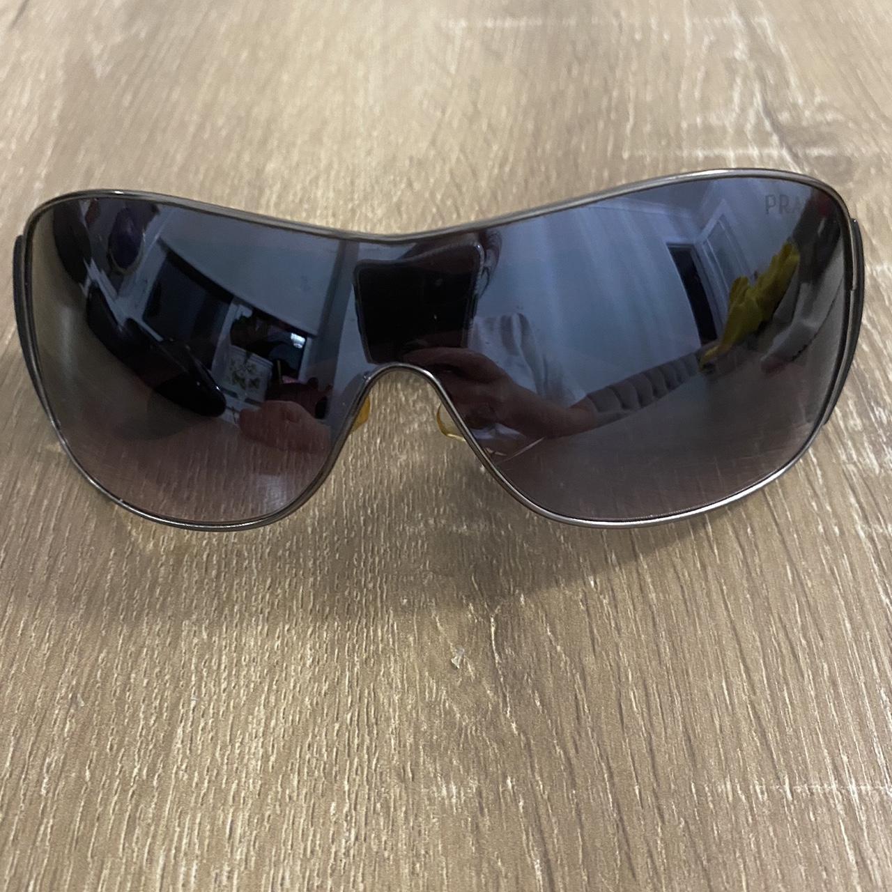 Prada Women's Black Sunglasses | Depop