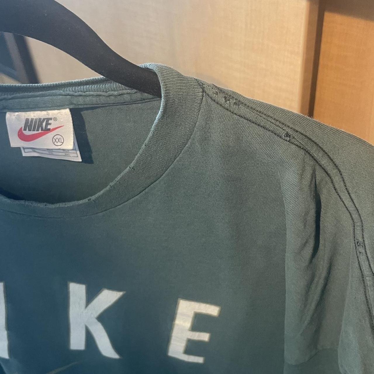 Nike t shirt clearance original vs fake