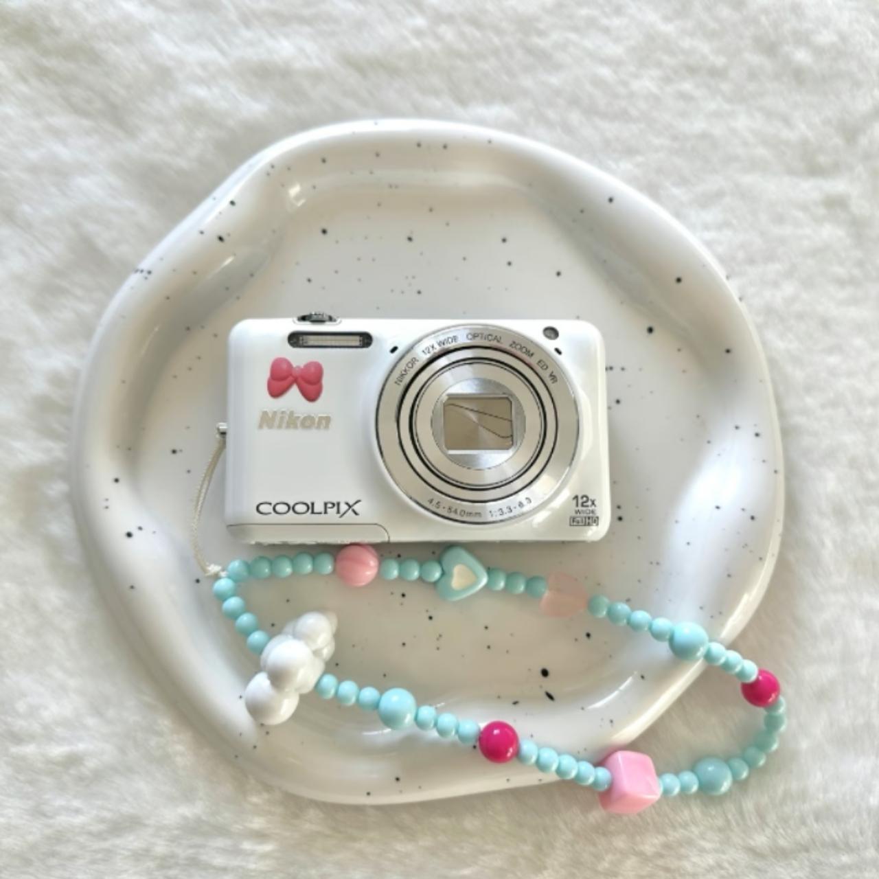 Nikon white coolpix s6600 flip screen digital | Depop Nikon white coolpix s6600 flip screen digital | Depop