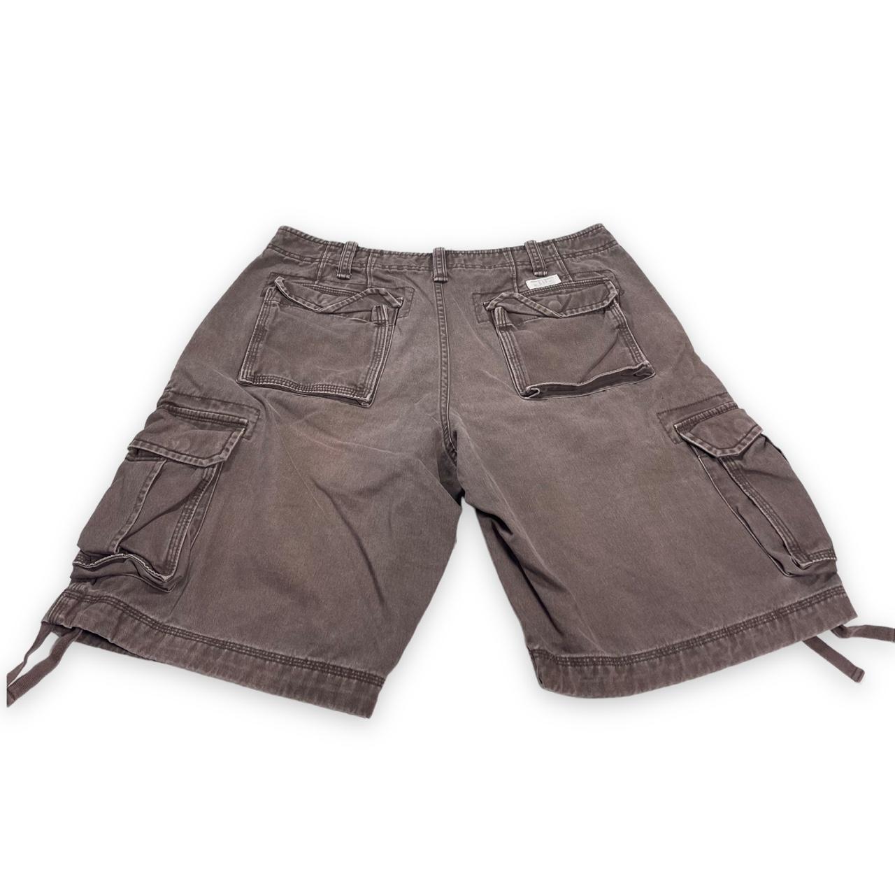 vintage cargo shorts in dark brown Brand: Gap Size... - Depop