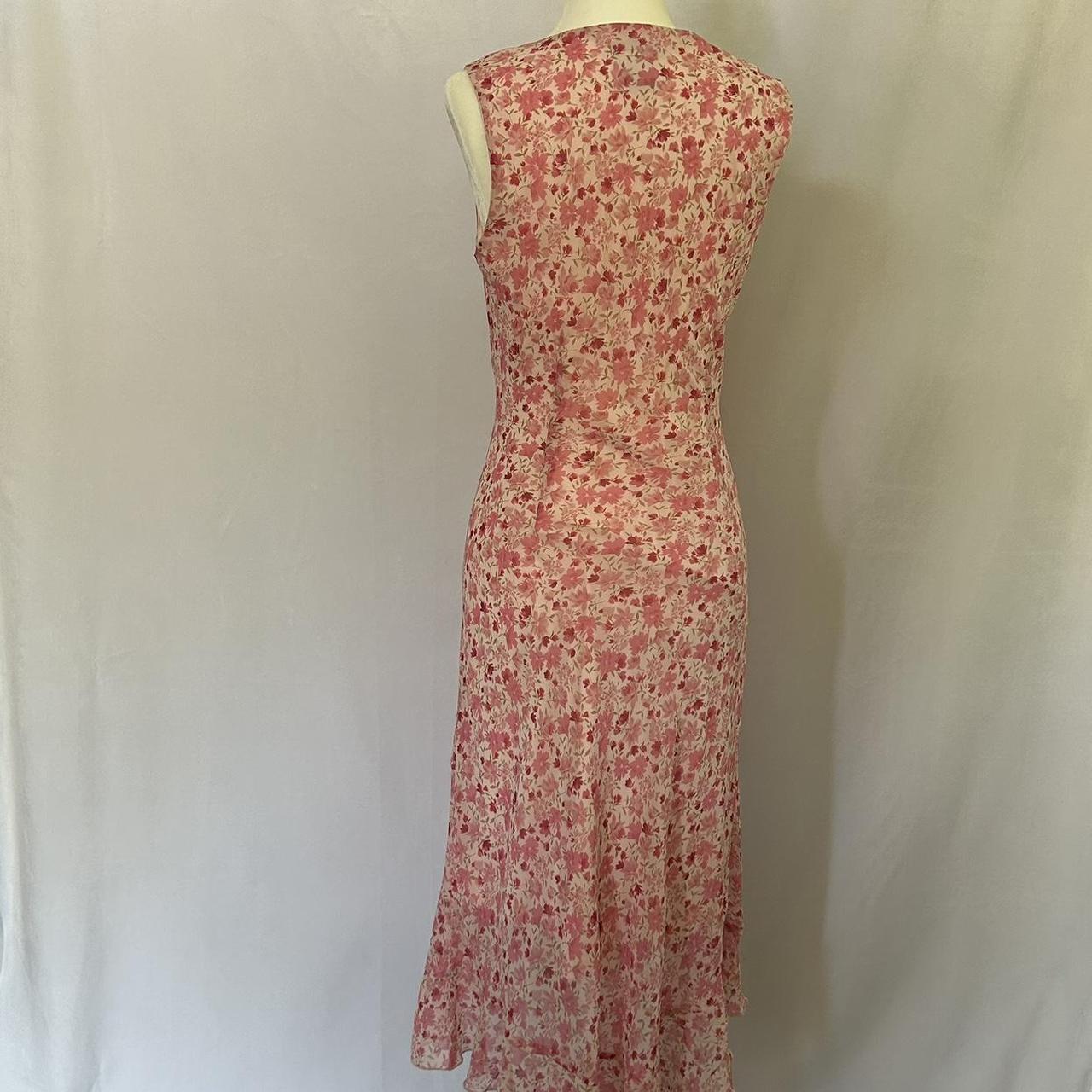 Pink floral midi dress. Labeled as a size 10 but... - Depop