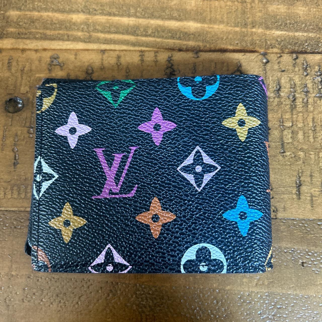 Real LV wallet Send offers!! It looks scratches - Depop