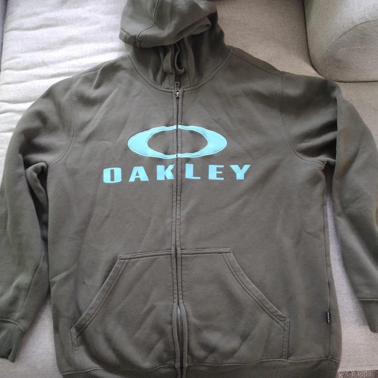 XL Oakley full zip hoodie. Previous owner is a smoker - Depop