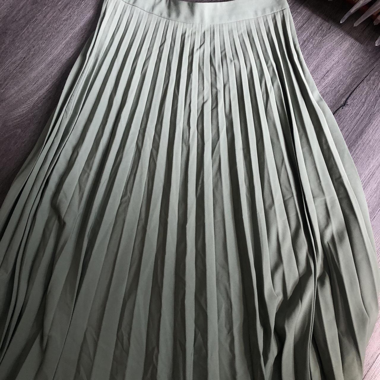 Olive green accordion maxi skirt from Stradivarius... - Depop