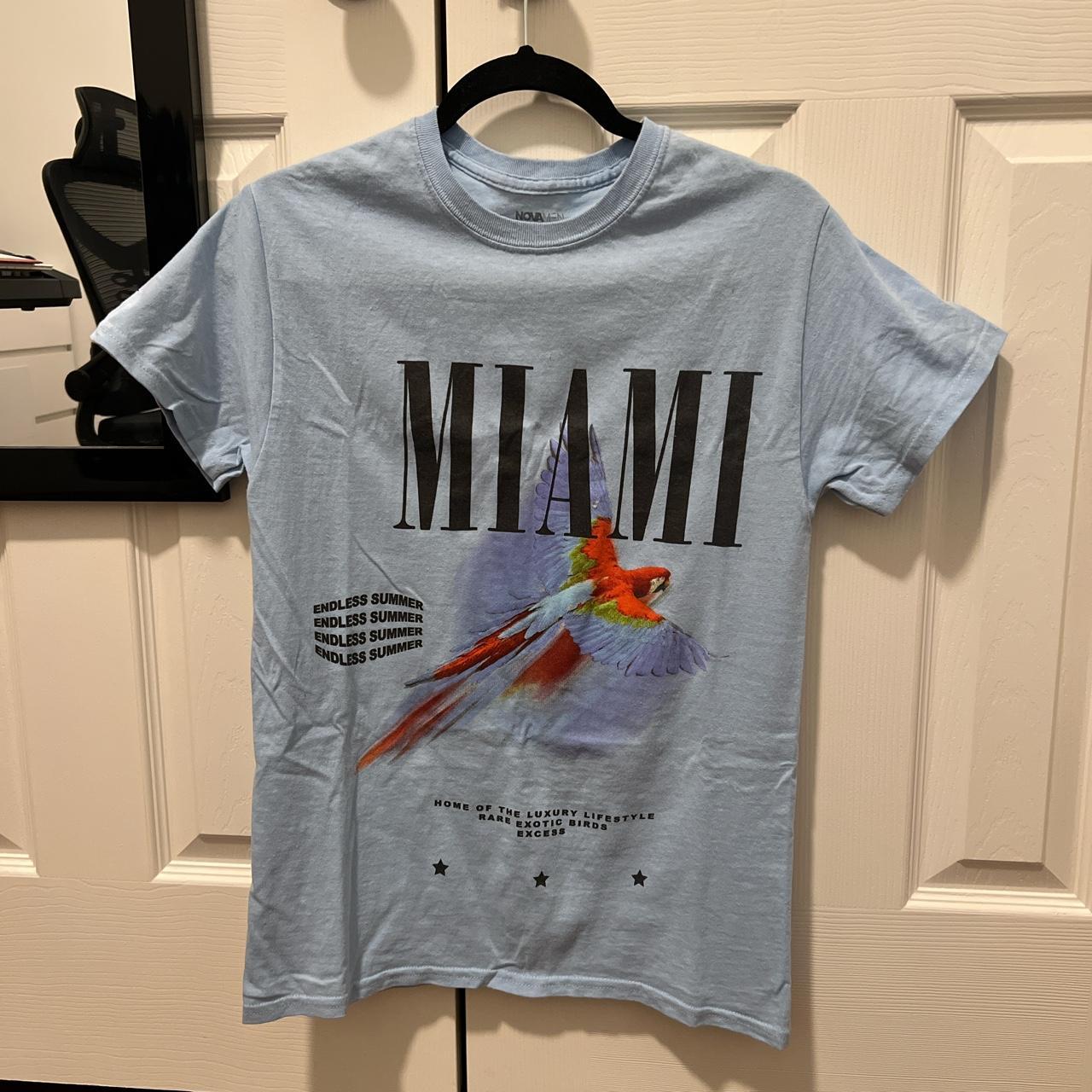 [baby blue graphic tee] that i grew out of. it was a... Depop