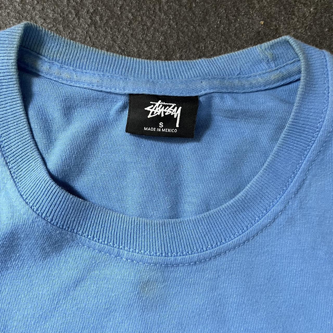 Baby Blue Stüssy tee Worn numerous times and has a... - Depop