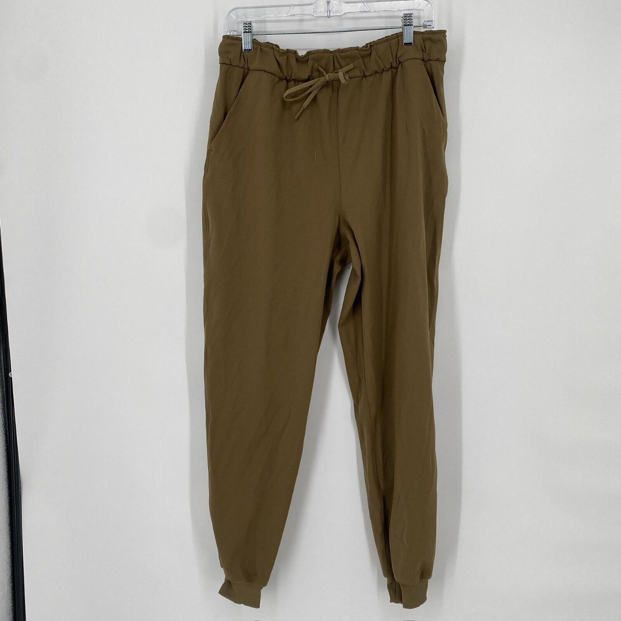 Lululemon pants women's brown 10 high rise jogger - Depop
