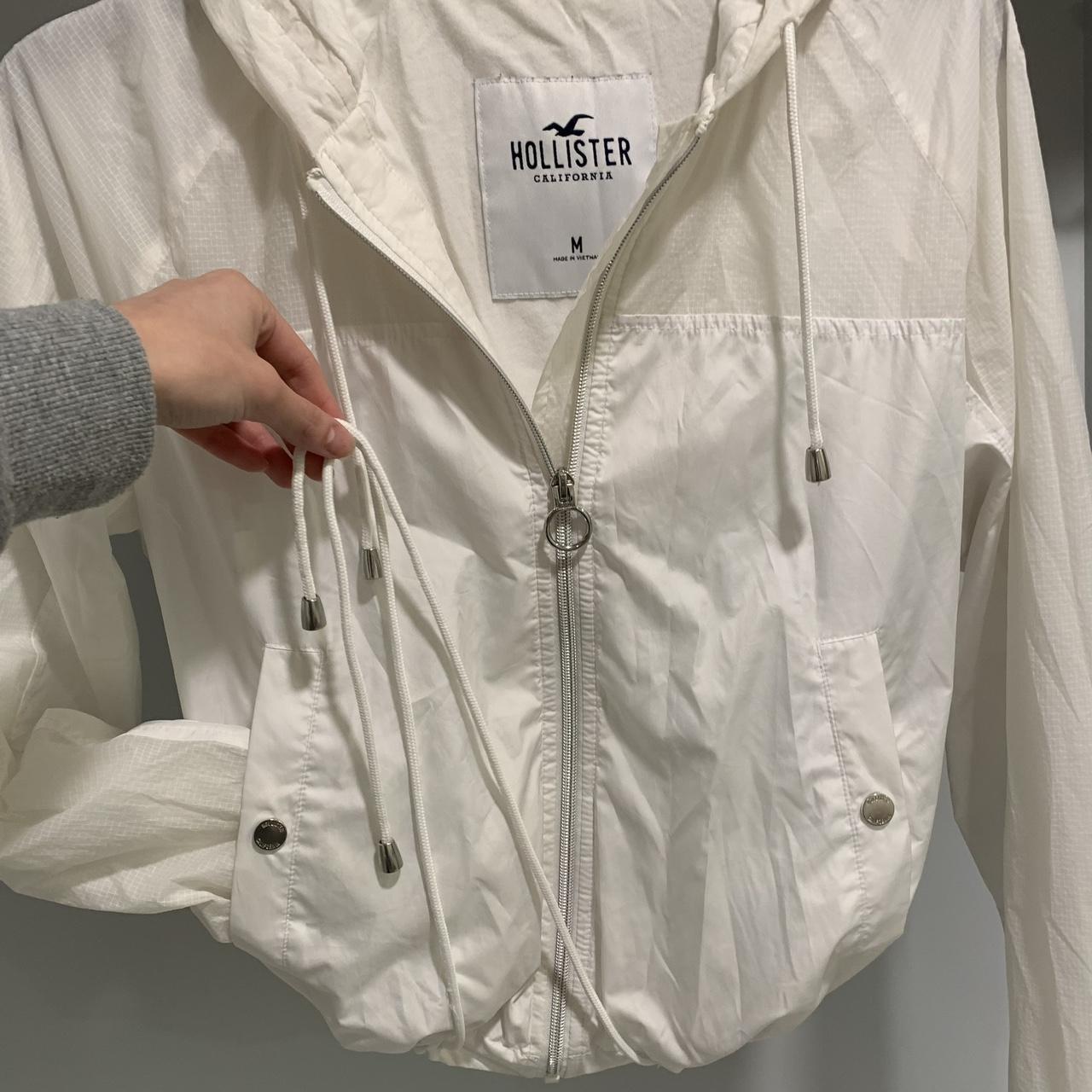 Hollister white windbreaker. perfect for rainy Depop