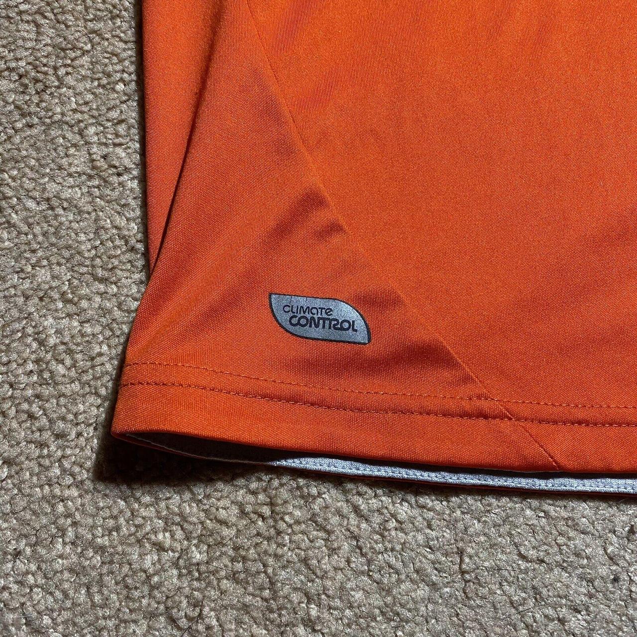 Umbro Men's Orange T-shirt | Depop