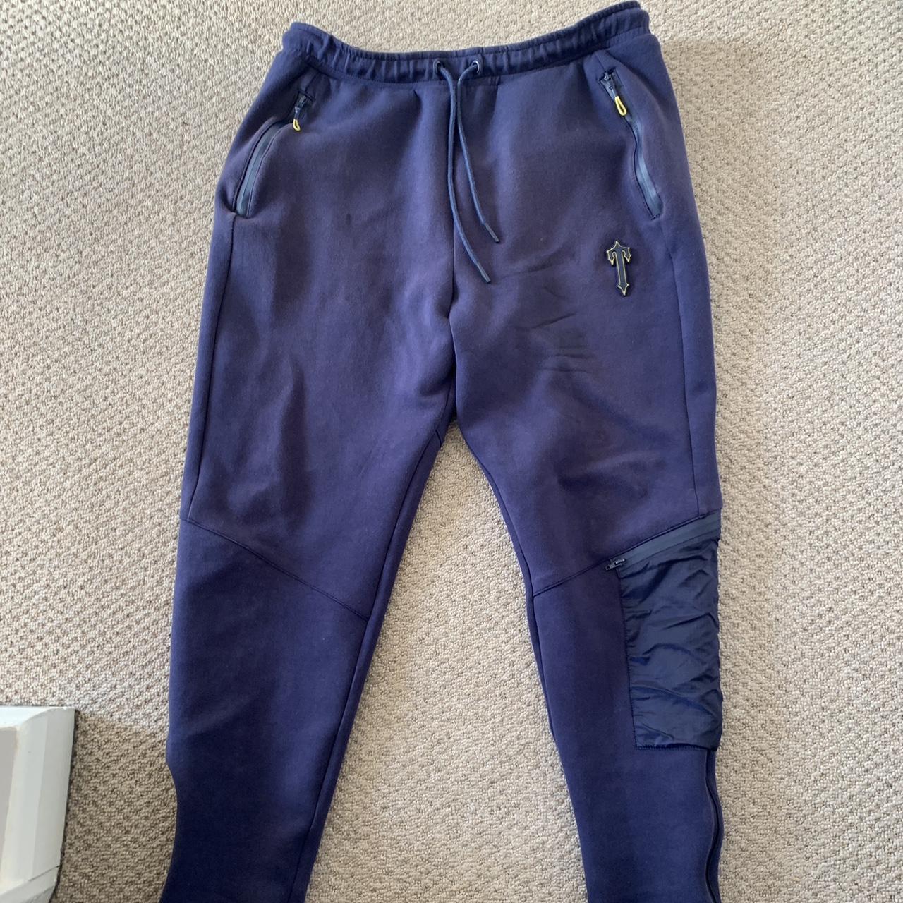 Navy blue trapstar tech fleece and bottoms, yellow... Depop