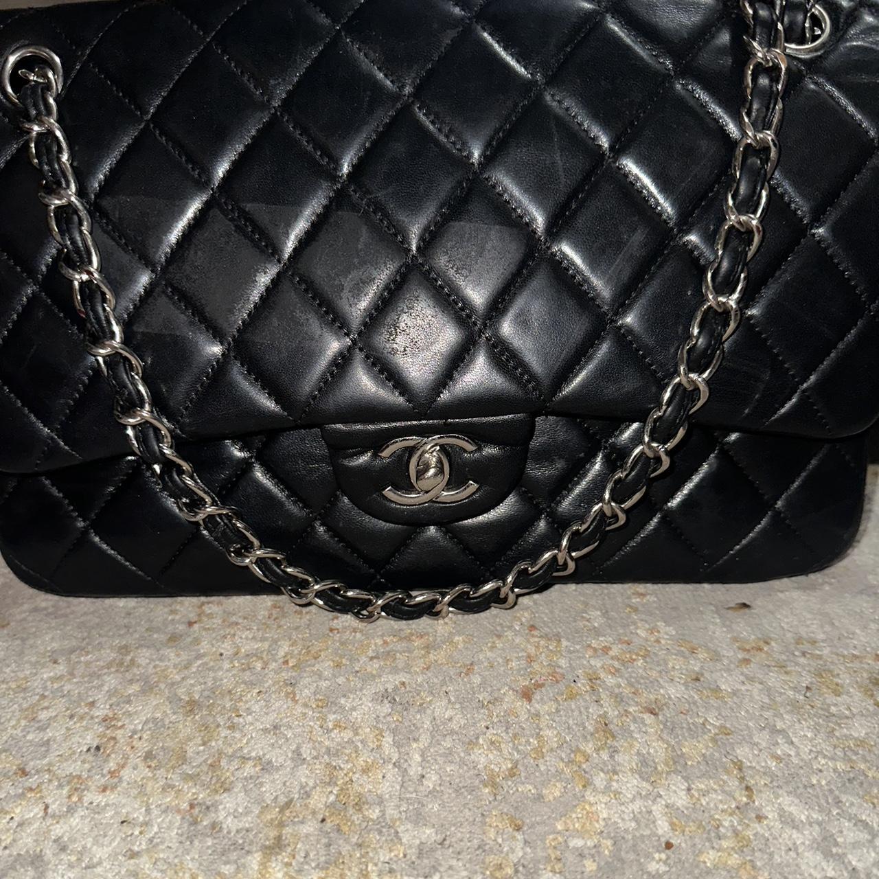 Black Classic Chanel leather quilted bag minor... - Depop