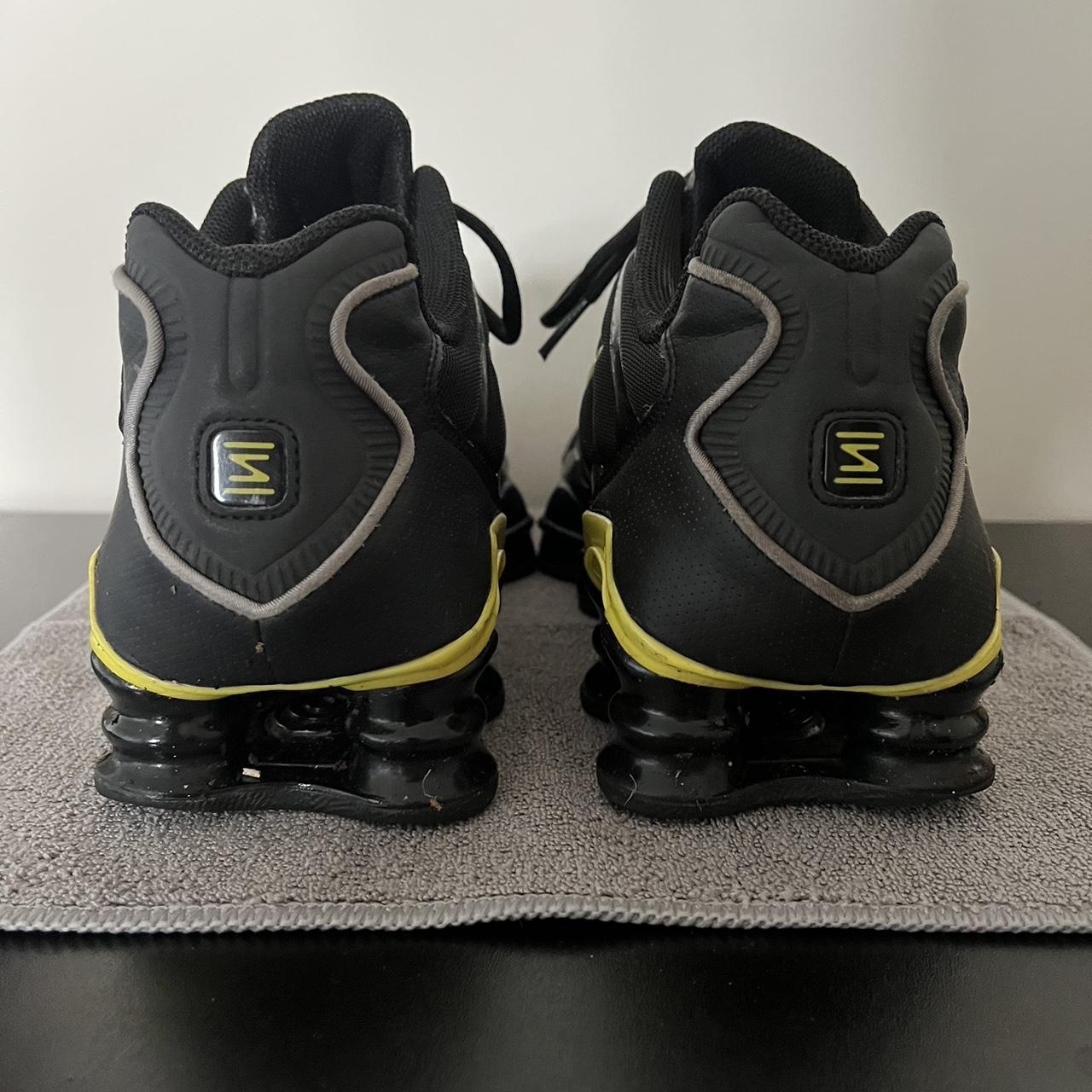 nike shox black yellow