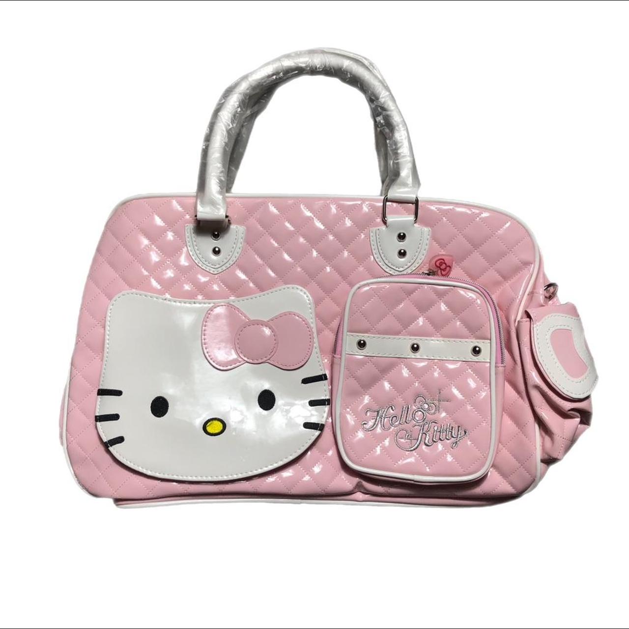 Baby Pink Hello Kitty PVC Shiny Stitched Dufflebag... - Depop