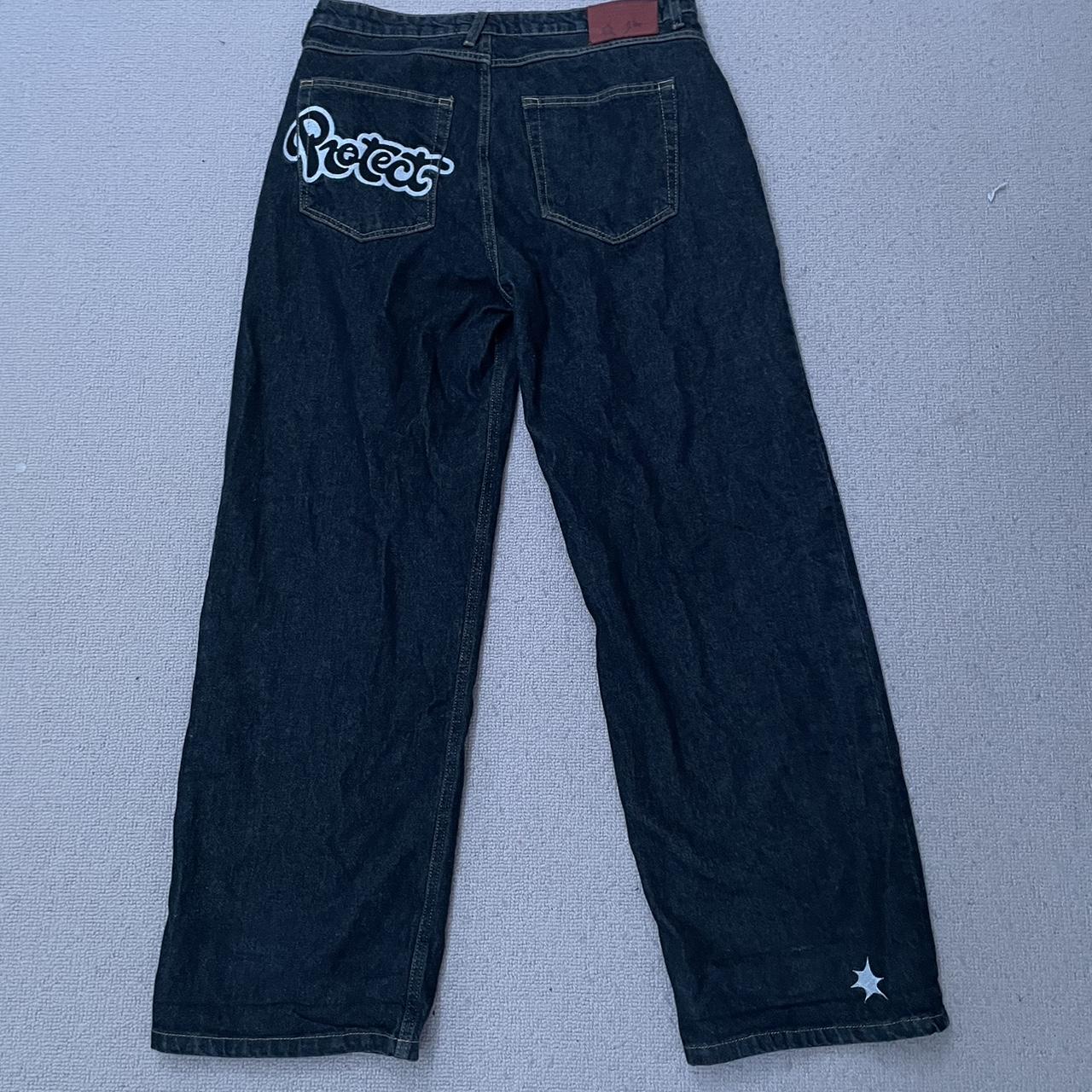 black and white protect ldn jeans size L supper... Depop