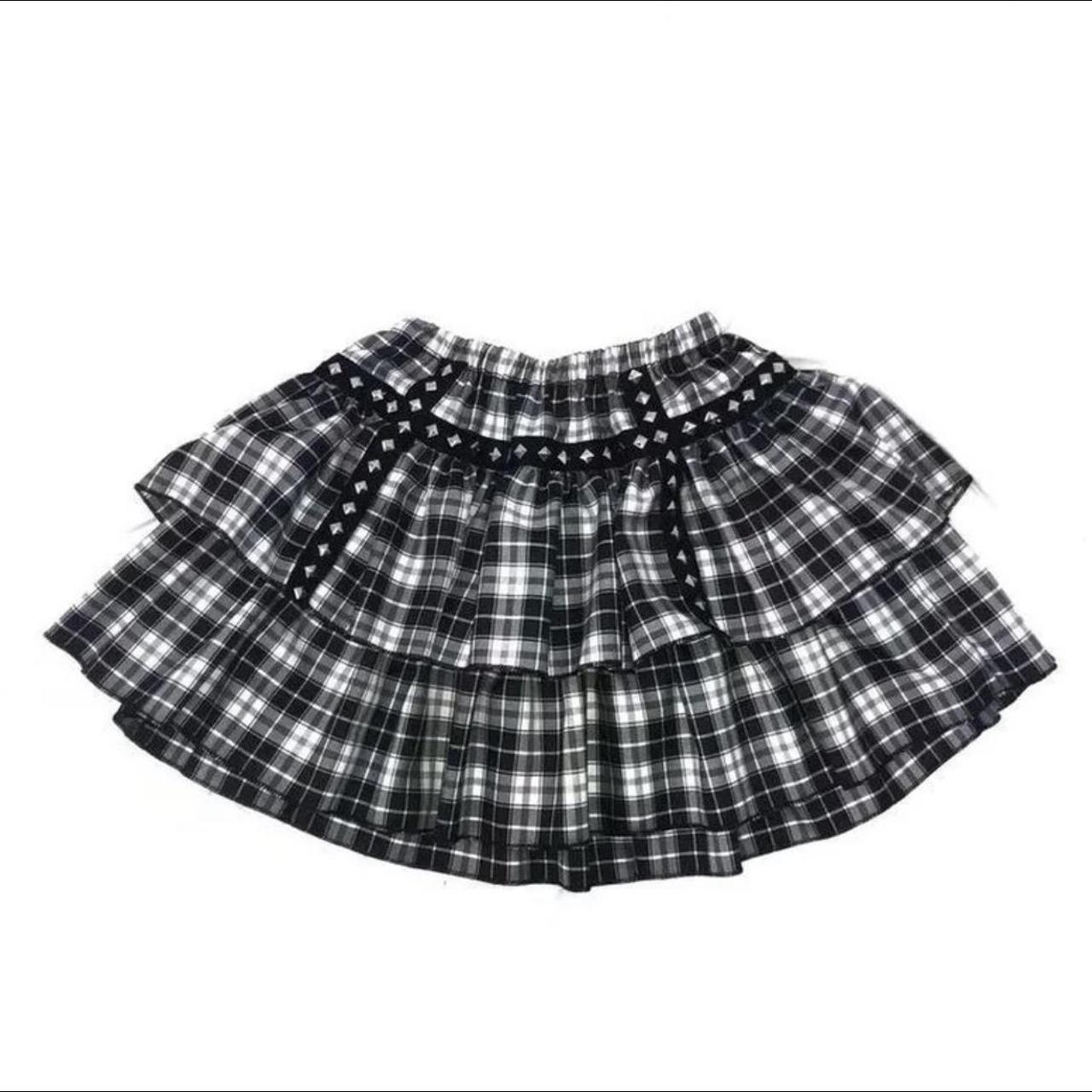 Black and white plaid shop skirt 7 little words