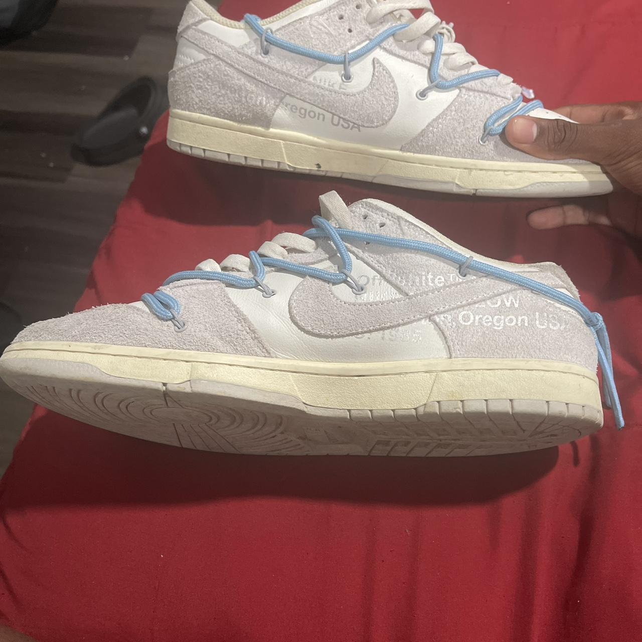 jordan 1 low crimson tint on feet