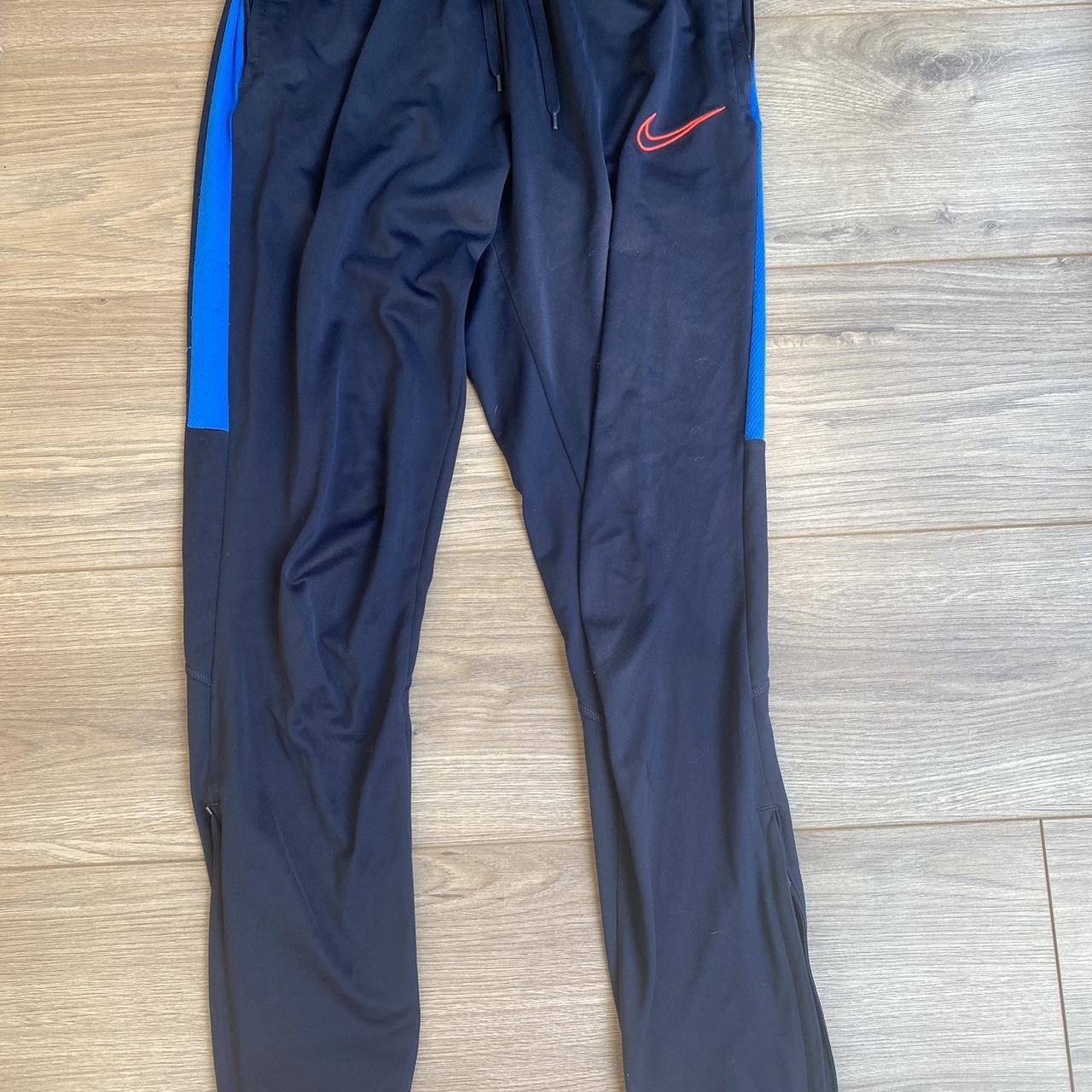 blue nike tracksuit womens