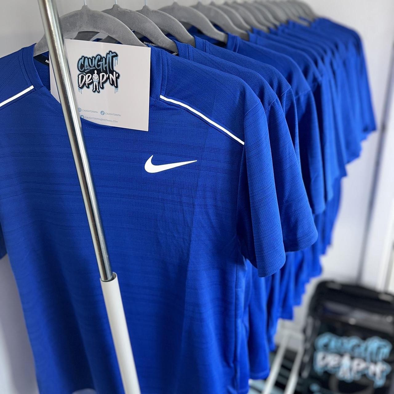 royal blue nike tee