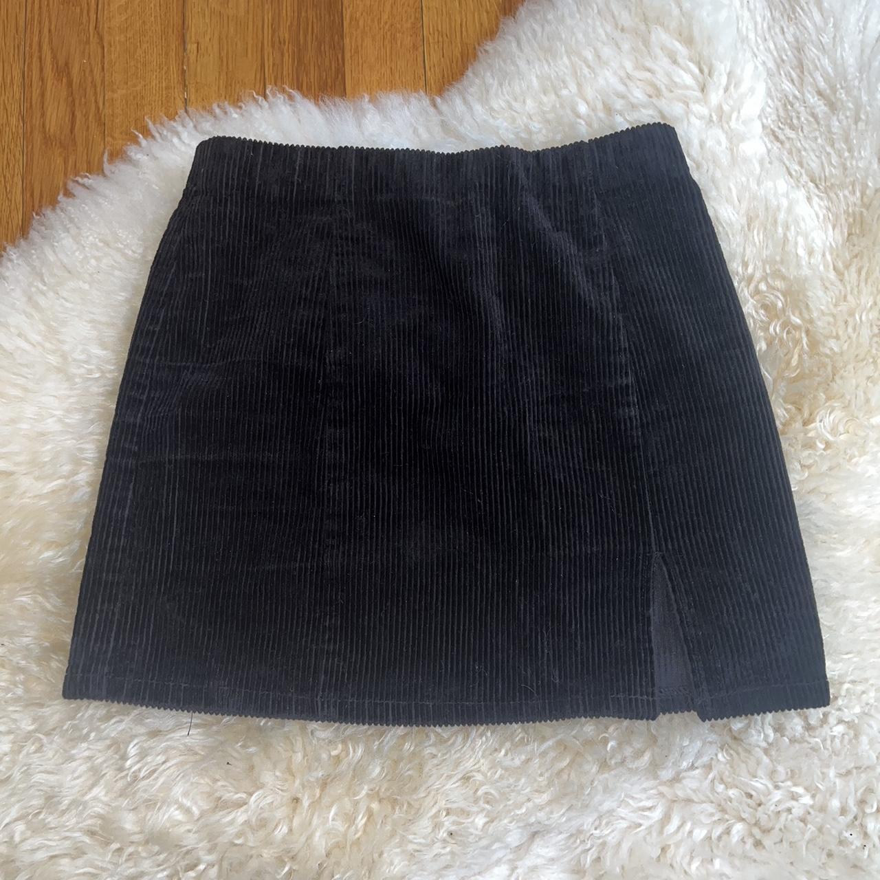 Black corduroy mini skirt with split Could be worn