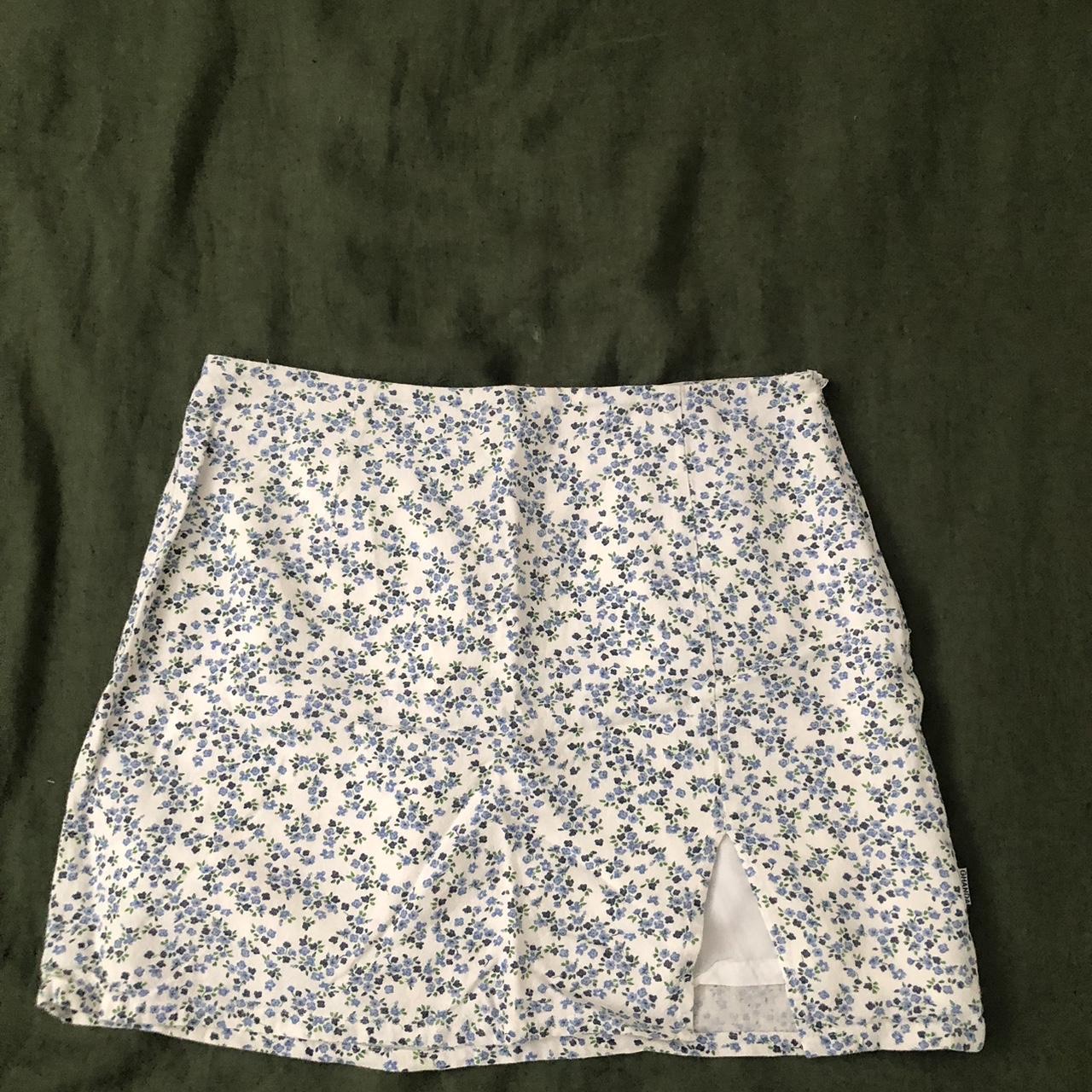 GHANDA - blue and white flower mini skirt with slit... - Depop