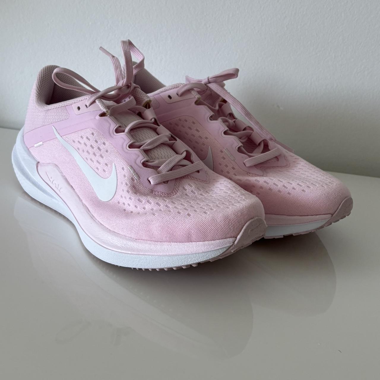 pink and white nike shoes for women