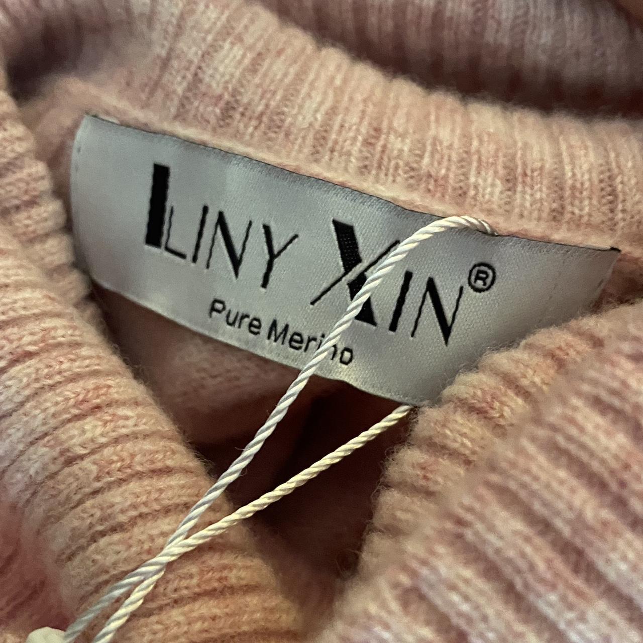 This LINY XIN sweater is crafted from 100 superfine Depop